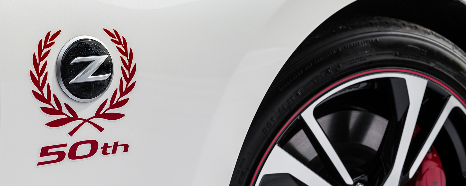 The exterior of the 370Z 50th Anniversary Edition mimics the livery of the original BRE race car and is available in two different paint schemes: white with red accents, or silver with black accents.